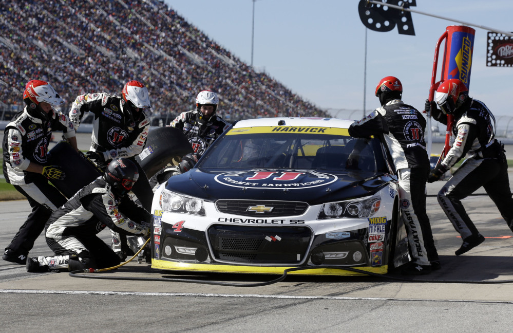 Kevin Harvick (4) makes a pit stop during the NASCAR Sprint Cup Series race Sunday at Chicagoland Speedway in Joliet, Ill.