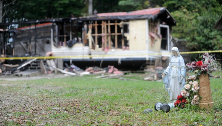 A mobile home at 289 Brown’s Corner Roadd in Canaan was destroyed in fire on Monday. This photo shows the charred remains on Tuesday, Sept. 22, 2015. It is the third fire in that town in three weeks.