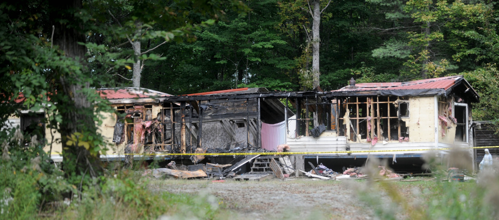 A mobile home at 289 Brown’s Corner Roadd in Canaan was destroyed in fire on Monday. This photo shows the charred remains on Tuesday. It is the third fire in that town in three weeks.