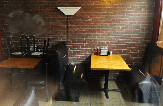 Seating at the Hallowell House of Pizza was damaged and the wall was spray painted inside the restaurant earlier this month. The Kennebec Journal blurred the writing on the wall because of its offensive nature.