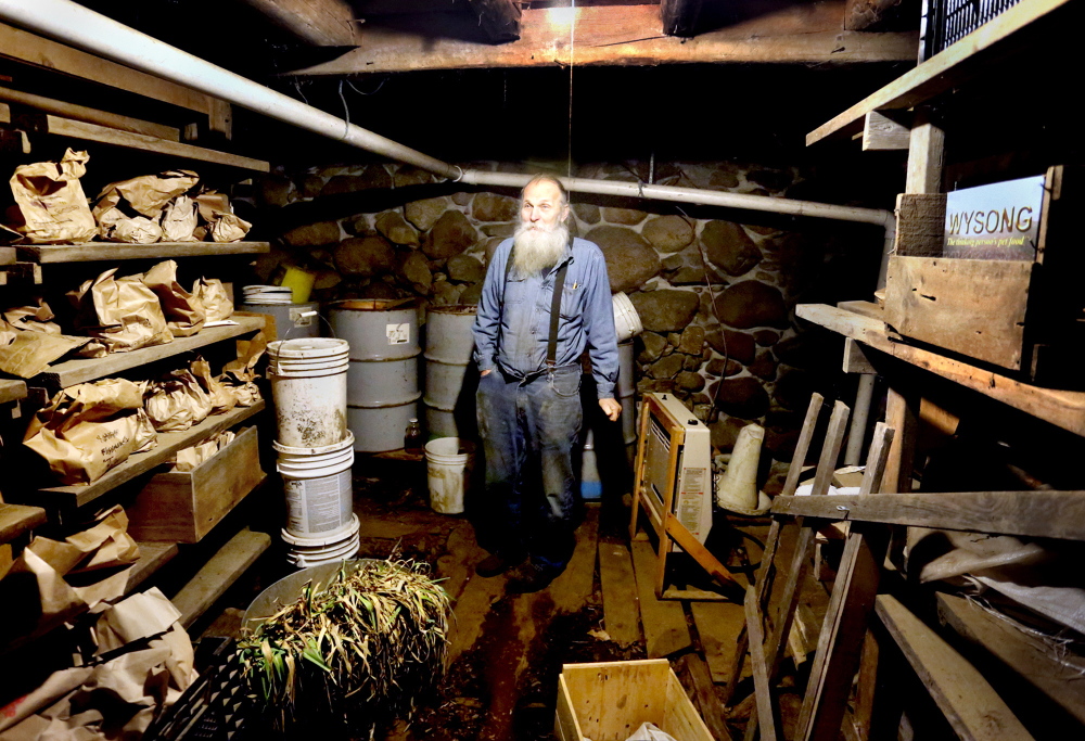 Will Bonsall, in his root cellar at his farm in Industry in 2013. Bonsall is giving Sunday’s keynote address at the Common Ground Fair, as well as speaking eight other times during the three-day event.