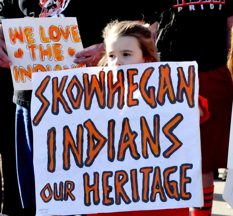 Skylar Carter joins a goupr to show support keeping the Indian nickname and mascot at Skowhegan High School in April. A group supporting keeping the nickname plans a Skowhegan Indian Pride rally on Columbus Day, while Maine Indians and their supporters are holding an Indigenous Peoples Day rally at Lake George in Skowhegna. The events are the latest surrounding the last school in the state that has Native American imagery.
