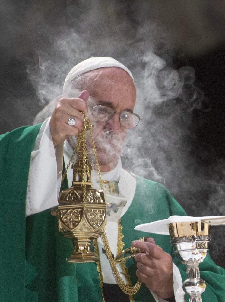 Pope Francis celebrates high Mass at Madison Square Garden on Friday evening.