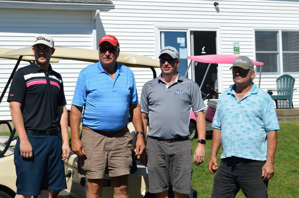 The winners of the tournament, from left, are Terry Whitcomb, Greg Reid, Jim Mylen and Josh Tripp.