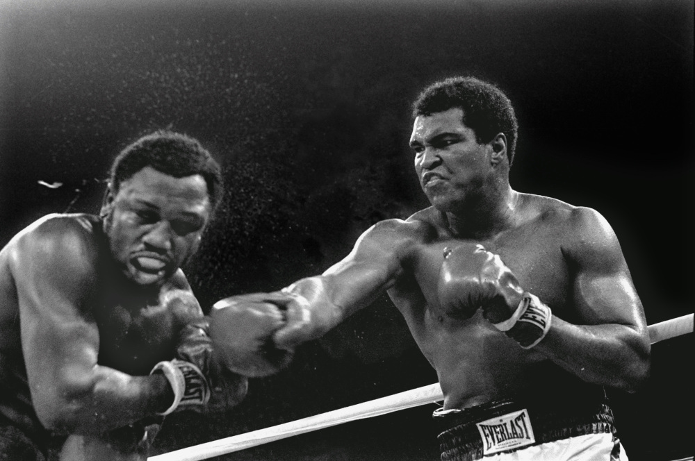 AP photo 
 In this Oct. 1, 1975, file photo, heavyweight champion Muhammad Ali connects with a right to challenger Joe Frazier in the ninth round of their title fight in Manila, Philippines. It was, Muhammad Ali would later say, the closest thing to death he had ever known.