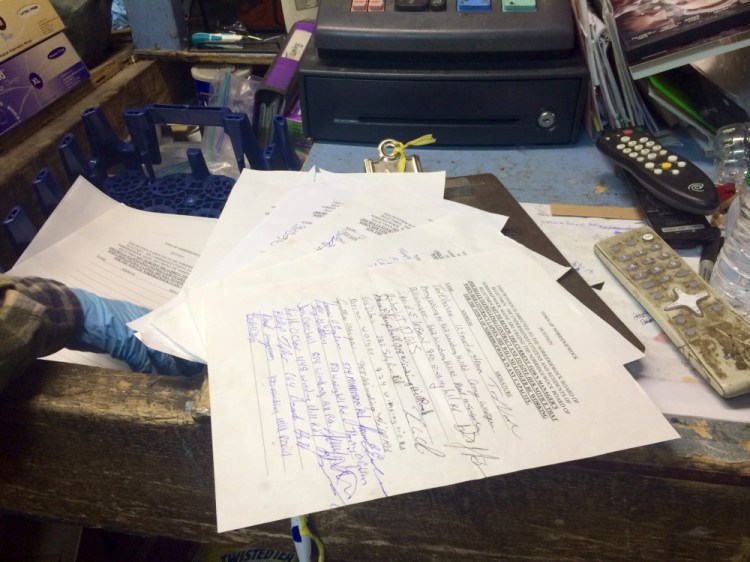 A petition at Triple D Redemption in Norridgewock, seen Wednesday, seeks signatures in calling for Town Manager Michelle Flewelling’s contract to not be renewed.