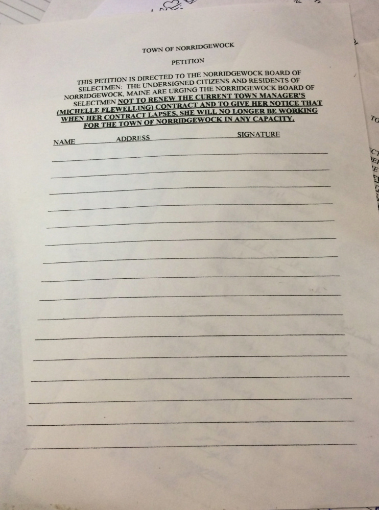 A petition at Triple D Redemption in Norridgewock, seen Wednesday, seeks signatures in calling for Town Manager Michelle Flewelling’s contract to not be renewed.