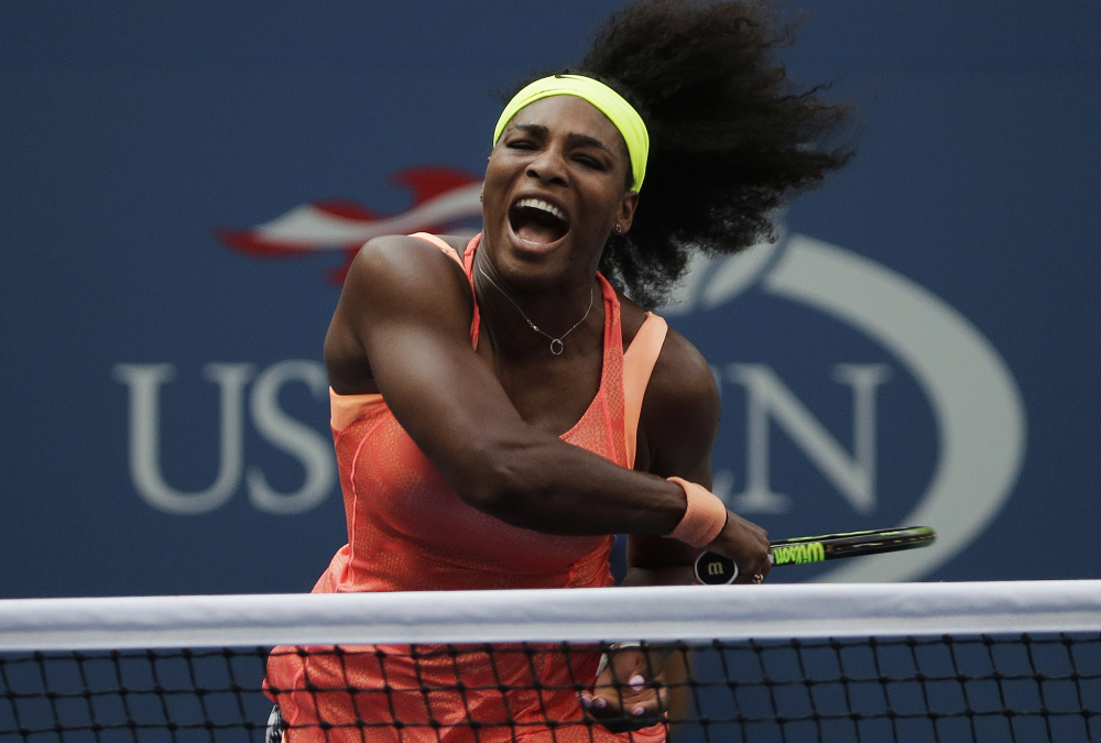 Serena Williams follows through on a return to Kiki Bertens of the Netherlands on Sept. 2 as she overcame service errors for a 7-6 (7-5), 6-3 win in the second round of the U.S. Open at New York.