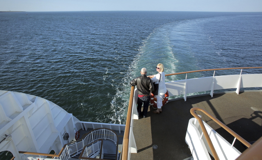 Passengers take in the view on Nova Star’s maiden voyage from Portland in May 2014. Despite an erosion in the number of travelers, analysts say there’s a solid market of people who prefer transportation by ferry.
