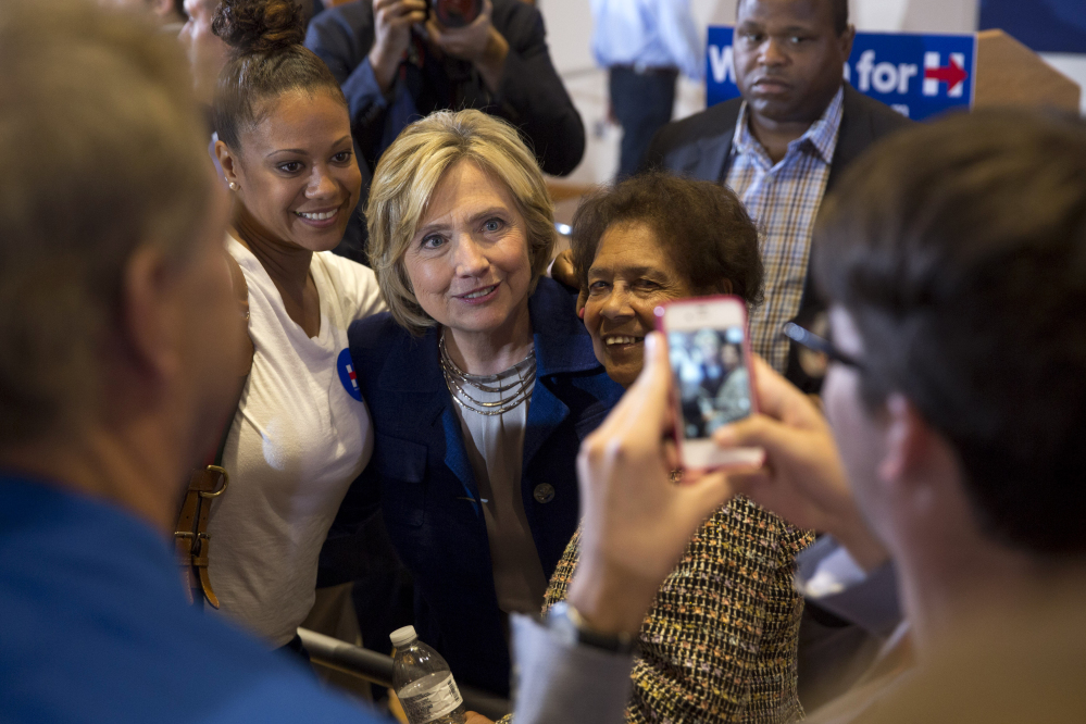 Democratic presidential candidate Hillary Clinton, seen posing for photos with supporters during an event in Iowa on Monday, plans another ‘grass-roots organizing meeting’ on Friday in Portland.
