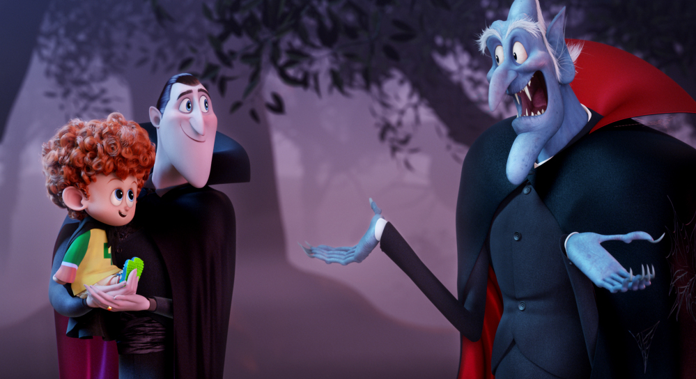 Dennis, left, voiced by Asher Blinkoff, Dracula, voiced by Adam Sandler, and Vlad, voiced by Mel Brooks, appear in “Hotel Transylvania 2,” which made $47.5 million over the weekend.
