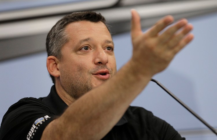 Tony Stewart answers a question during a news conference to announces his retirement from driving NASCAR Sprint Cup series racing at Stewart-Haas Racing's headquarters in Kannapolis, N.C., Wednesday.