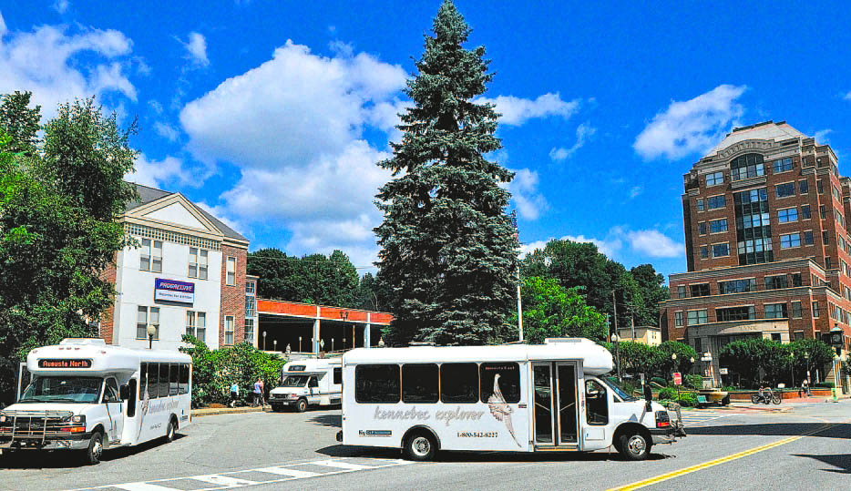Kennebec Explorer bus routes converge at Market Square in downtown Augusta in 2011. Augusta is one of the stops on the experimental “Cultural Explorer” route this weekend, that will ferry people to and from the three festivals in Waterville this weekend.