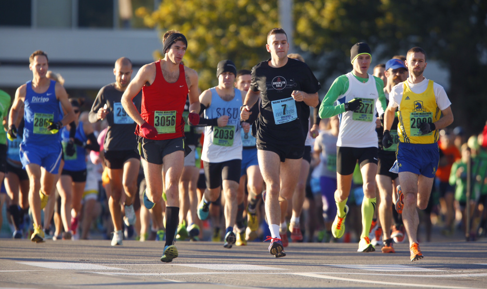 Runners start the Maine Marathon along Baxter Boulevard on Sunday morning.