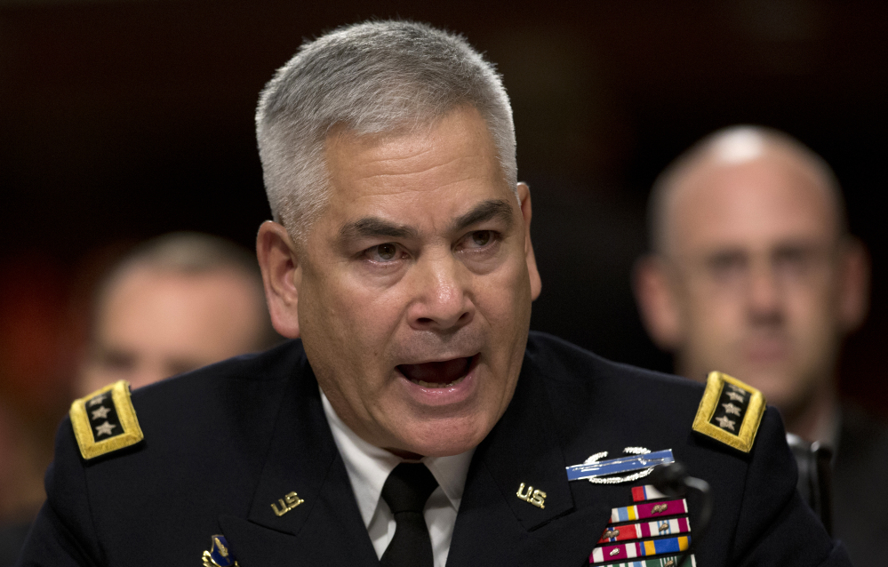 U.S. Forces-Afghanistan Resolute Support Mission Commander Gen. John Campbell testifies on Capitol Hill in Washington, Tuesday before the Senate Armed Services Committee hearing on the Situation in Afghanistan.