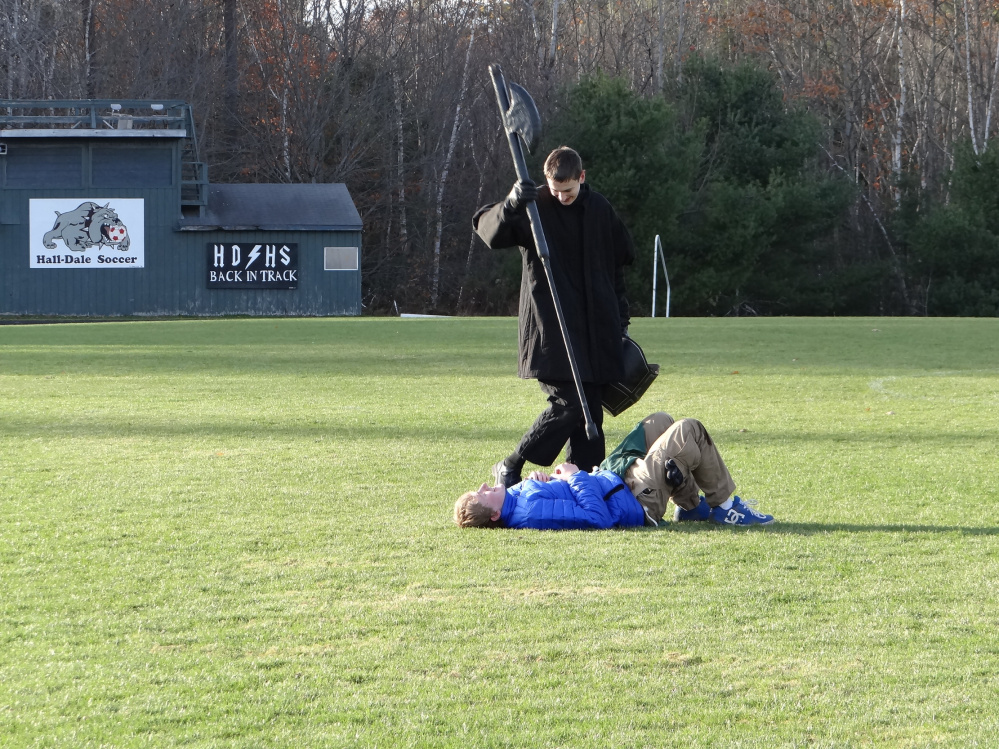 The Black Knight (Nate Stahlnecker) stands over his “victim” (Barry Nitzel) after a duel at last year’s LARPing event.
