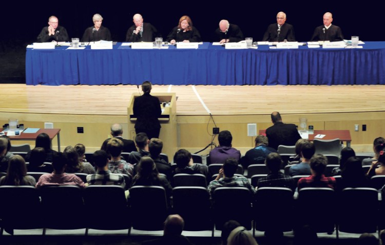 Students and staff at Mt. Blue High School in Farmington listen the Maine Supreme Judicial Court at the conclusion of arguments on Wednesday. From left are Justices Jeffrey Hjelm, Ellen Gorman, Donald Alexander, Chief Justice Leigh Saufley, Andrew Mead, Joseph Jabar and Thomas Humphrey.