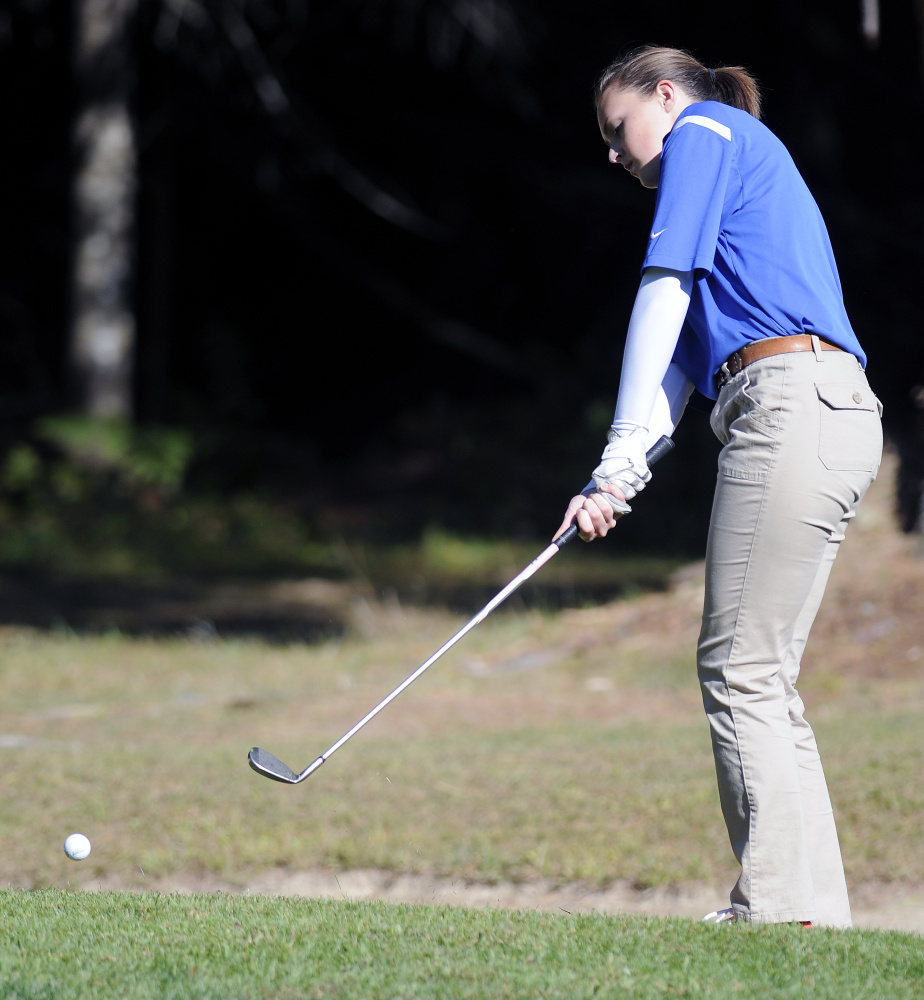 Staff photo by Andy Molloy
Madison Area Memorial High School’s Allison Dean hits on to a green during the Mountain Valley Conference state golf qualifier Wednesday at Natanis Golf Course. Dean shot a 111, just missing the cut for the individual state championships by a shot.