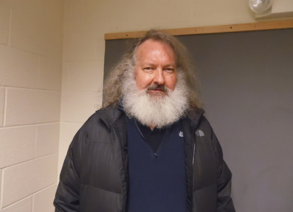 In a photo provided by the Vermont State Police, actor Randy Quaid stands in the Vermont State Police barracks in St. Albans, Vermont, on Friday.