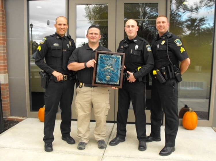 Waterville police, from left, Sgt. Brian Gardiner, Detective Jason Longley, Officer Ryan Dinsmore and Sgt. Lincoln Ryder, came in first last week in a statewide shooting and physical fitness contest sponsored by the Portland Police Department, beating seven other teams from around the state. Also on the team, not pictured, was Officer Dan Ames.