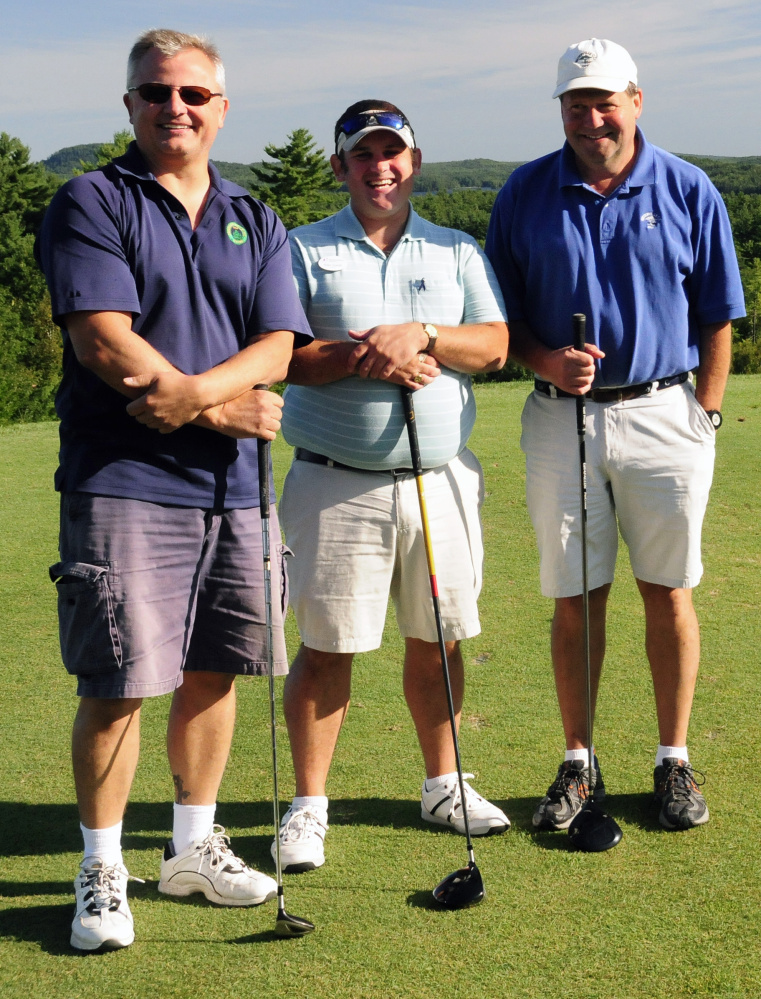 First place net was won by the Mayberry Builders threesome, from left, are Zlatko Necevski, Alex Gaeth and David Mayberry.