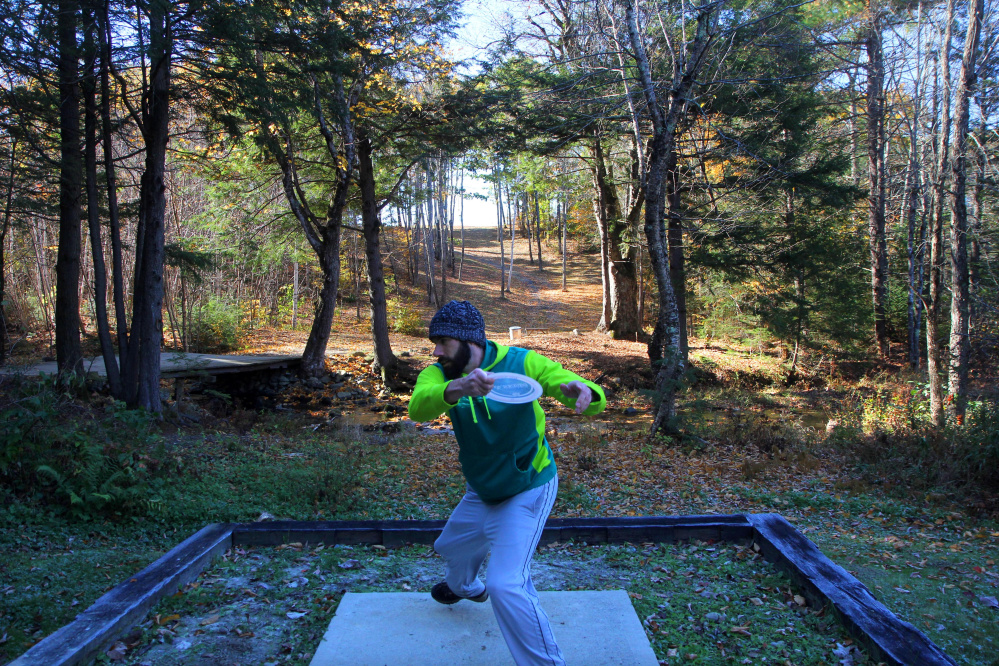 Byron Philbrook of Scarborough tees off on No. 18 during the 2nd annual Porcupine Ridge PDGA Open on Sunday in Augusta.