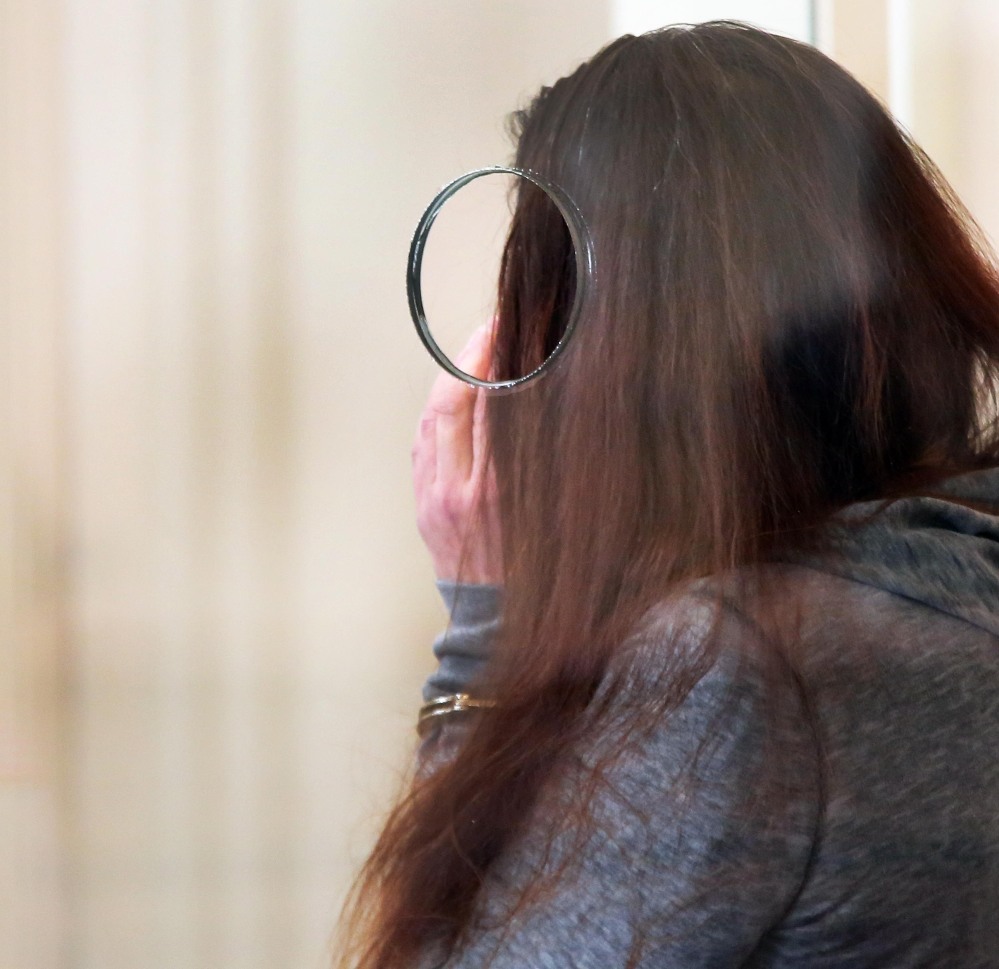 Rachelle Bond attends a hearing Tuesday in Dorchester District Court in Boston. Bond is charged with being an accessory after the fact in helping to dispose of the body of her daughter, Bella, the girl dubbed “Baby Doe.” Her boyfriend, Michael McCarthy is charged with murder in the case.