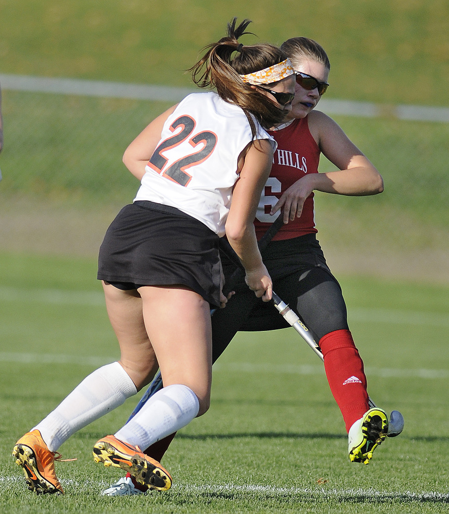 Gardiner Area High School’s Skye Lavoie, left, collides with Camden Hills Regional High School’s Sadie Mills during a Class B North quarterfinal game Tuesday in Gardiner.