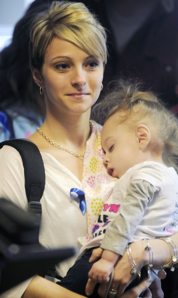 Jamie Davis, of New Sharon, holds her daughter, Addilyn, before attending a hearing in April on a bill that would require newborns in the state be tested for Krabbe disease. Addilyn, 4, died Wednesday morning from complications of the genetic disorder of the central nervous system.