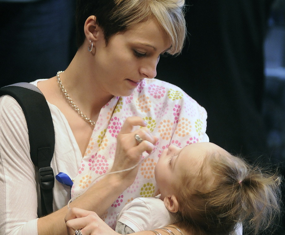 Jamie Davis, of New Sharon, clears the mouth of her daughter, Addilyn, before attending a hearing in April on a bill that would have put screening for Krabbe disease and similar disorders on the list of what’s tested for in newborns in the state. Addilyn died Wednesday morning.