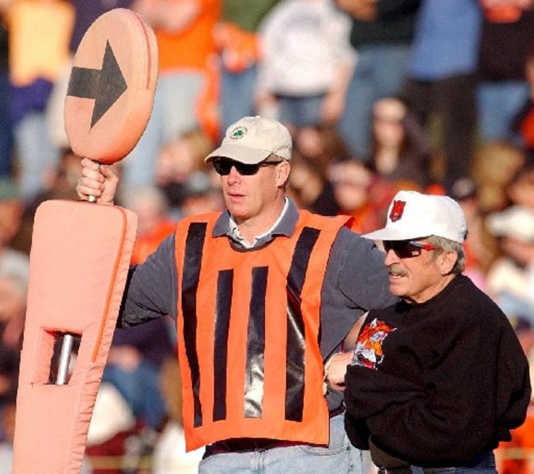 Sonny Gamache, right, stands with Chip Foldsom during a 2005 high school football game at Alumni Field in Augusta.