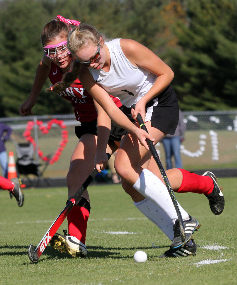 Photo by Jeff Pouland 
 Skowhegan Area High School's Julia Steeves battles for the ball with Cony High School's Julia Nicol during the first half of a Class A North seminfinal game on Saturday in Skowhegan.