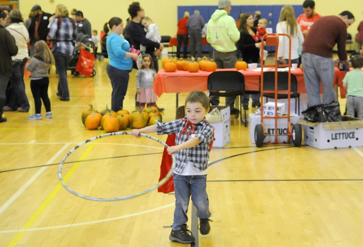 Brodyn Rood, 5, of Albion, busts a move Sunday during the Little Heart Hero Day at the Augusta YMCA. Rood and other children with heart afflictions played together during the event.
