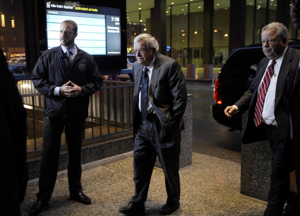 Former House Speaker Dennis Hastert, center, arrives at the federal courthouse Wednesday in Chicago.