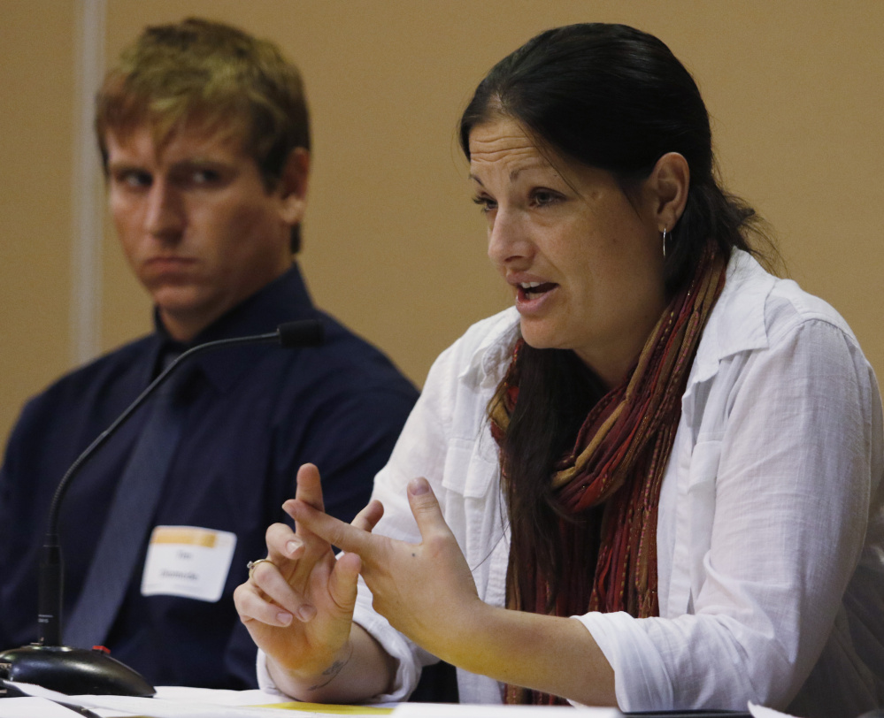 Danielle Rideout of Tri-County Mental Health Services, right, joined by Tim Diomede of the State Epidemiological Outcomes Workgroup, speaks Wednesday at a conference in Portland aimed at reducing the numbers of drug-affected babies.