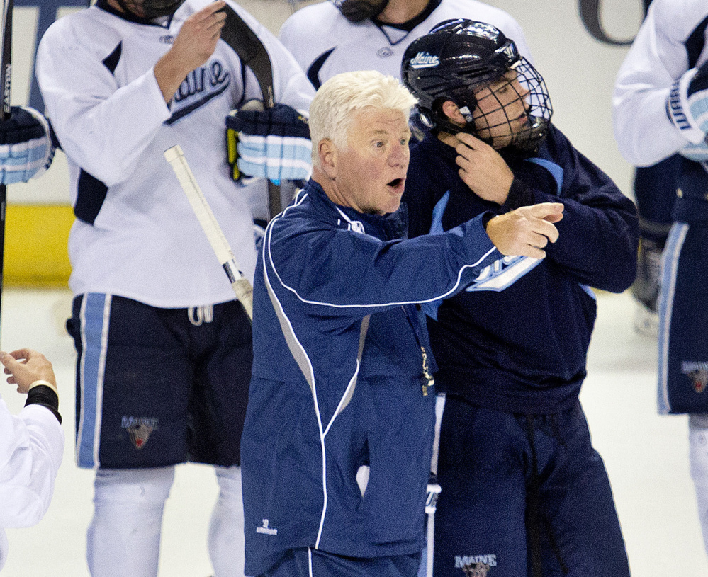 Maine hockey coach Red Gendron leads his team through a final practice Thursday at the Cross Insurance Arena before Friday night’s opener against Michigan State.