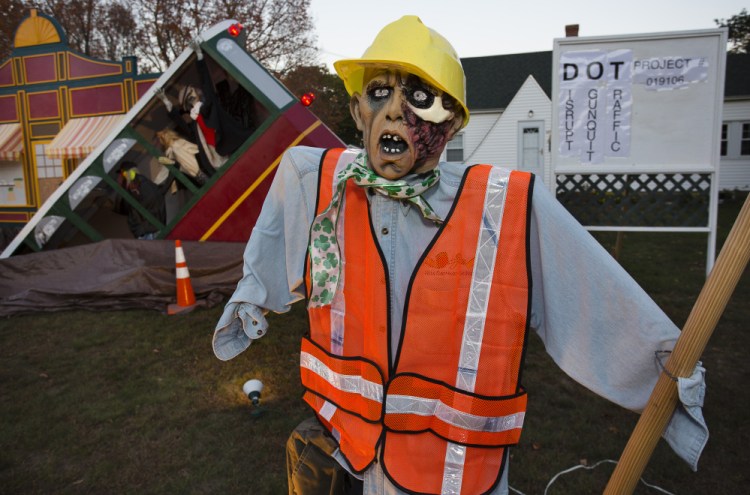 Even state construction workers are amused by the elaborate Halloween display in Ogunquit. "I think it’s perfectly fine,” said Mike Gowen, a laborer on the job site.
Carl D. Walsh/Staff Photographer