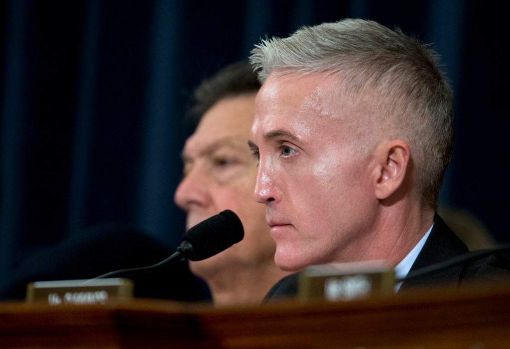 Rep. Trey Gowdy, R-S.C., chairman of the House Benghazi Committee, listens as Hillary Clinton testifies before the committee Thursday. Gowdy portrayed the investigation as focused on the facts and said Republicans are not trying to prosecute Clinton, a Democratic presidential candidate.