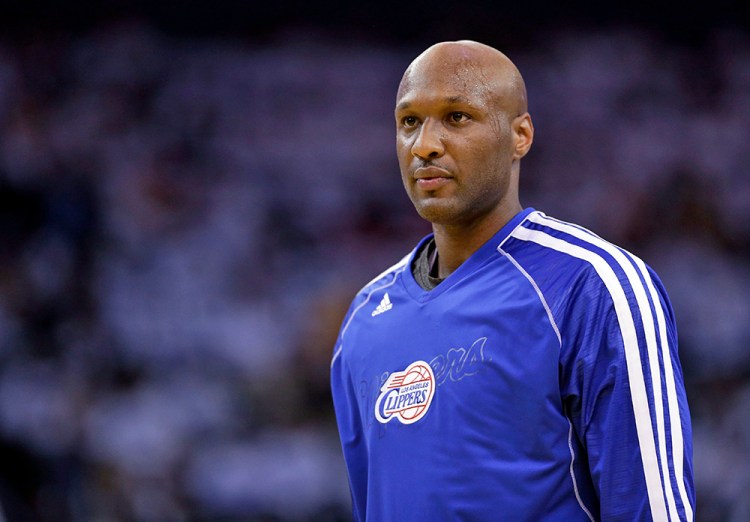 Former Los Angeles Clipper Lamar Odom, pictured in a 2013 game against the Golden State Warriors. The Associated Press