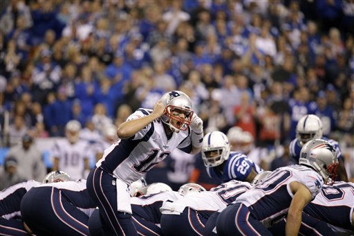 New England Patriots quarterback Tom Brady yells on the line of scrimmage in the first half of an NFL football game against the Indianapolis Colts in Indianapolis, Sunday, Oct. 18.  (AP Photo/John Minchillo)
