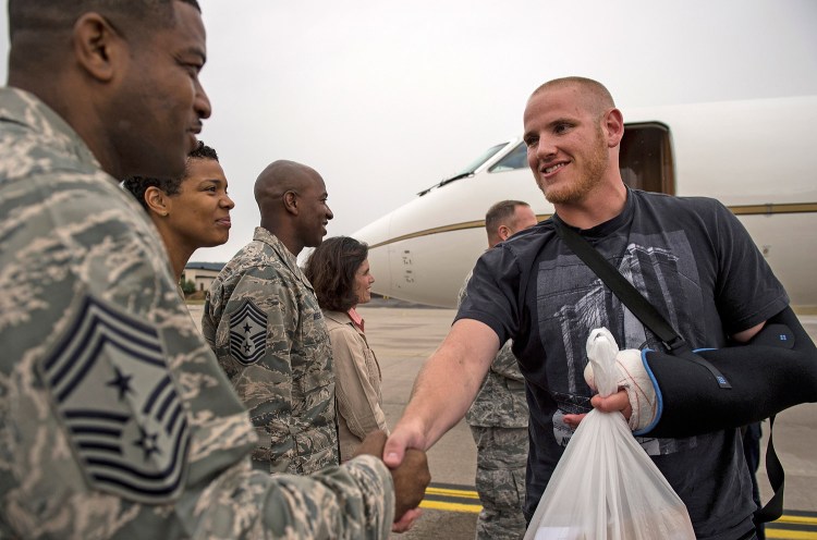 In this Aug. 24 photo, U.S. Air Force Airman 1st Class Spencer Stone, arrives at Ramstein Air Base, Germany, after  French President Francois Hollande awarded him, two other Americans and a British citizen with France's highest honor, the Legion d'honneur, for helping disarm a machine gun-toting suspected Islamist militant on a train.. 