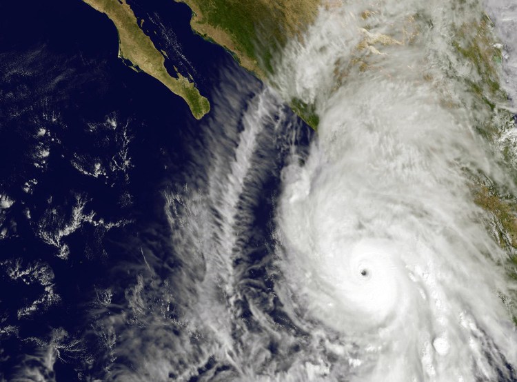 This satellite image taken at 1:45 p.m. EDT on Friday shows the eastern quadrant and pinhole eye of Hurricane Patricia moving towards southwestern Mexico. The Category 5 storm is strongest ever recorded in the Western Hemisphere, according to forecasters.  