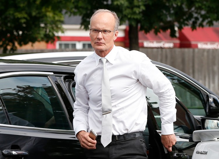 Dentist Walter Palmer arrives at his office in Bloomington, Minn., in this Sept. 8 photo. The Associated Press