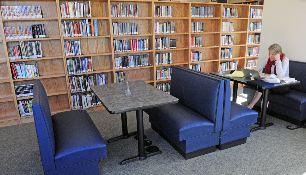 Susan Onion finds a quiet table to get some work done on Friday at C.M. Bailey Public Library in Winthrop.