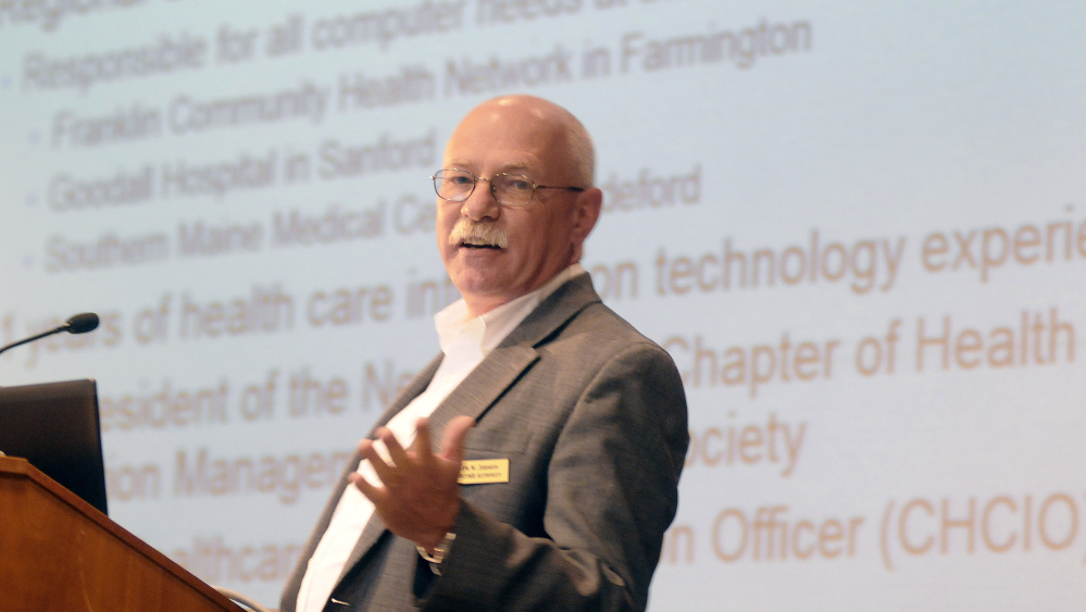 Ralph Johnson, a member of the ConnectME Authority, speaks Sunday at the University of Maine at Augusta, stating that broadband connections can enable people to manage chronic disease from home.