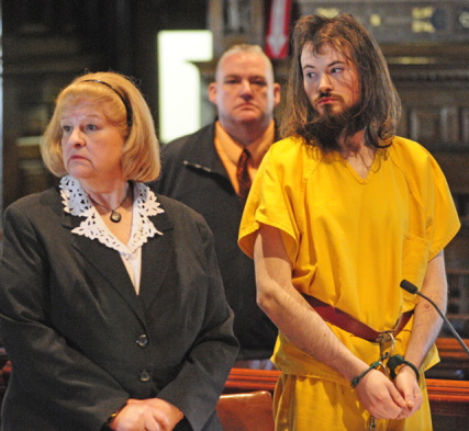 Attorney Pam Ames stands with Leroy H. Smith III in this May 2014 file photo taken during his initial appearance in Kennebec County Superior Court.