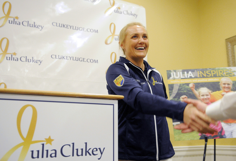 Julia Clukey is congratulated Monday after she announced that she will attempt to earn a spot on the 2018 Olympic Luge Team.