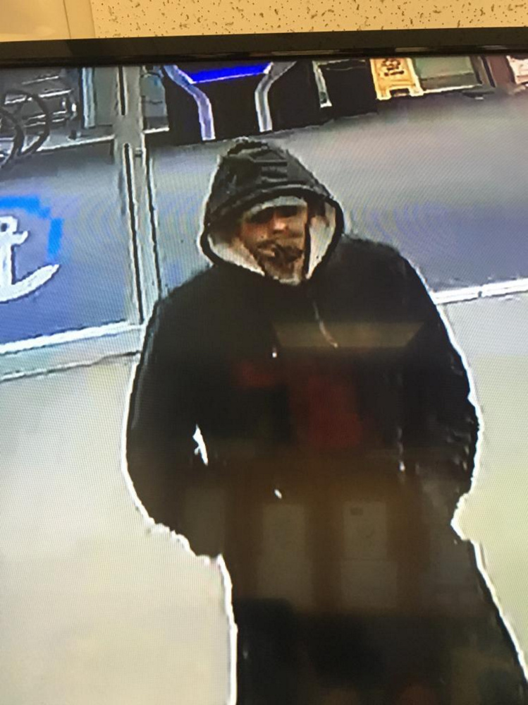 Surveillance footage of the man who robbed the Camden National Bank in Goggins IGA in Randolph on Saturday.
