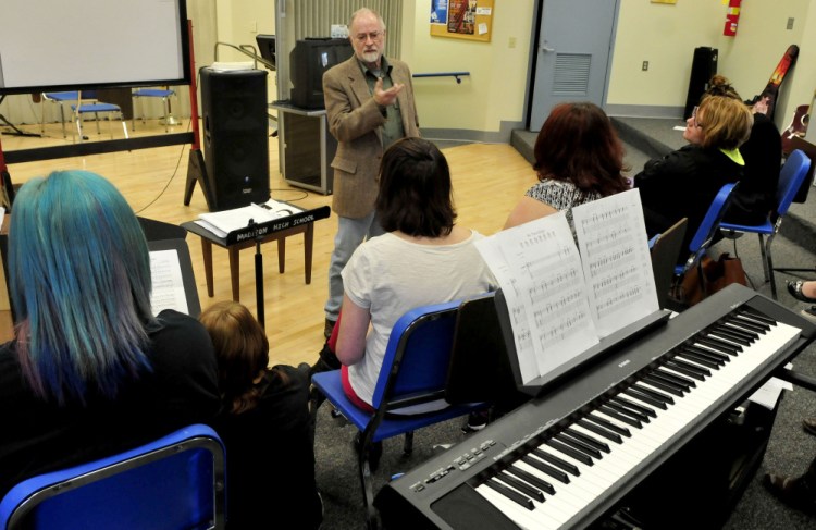 Musician John Foss of Palermo speaks with Madison Area Memorial High School students about his decades of playing trumpet with various bands including the Navy, Tommy Dorsey Band and the Beach Boys, during a Career Day event at the school on Wednesday.