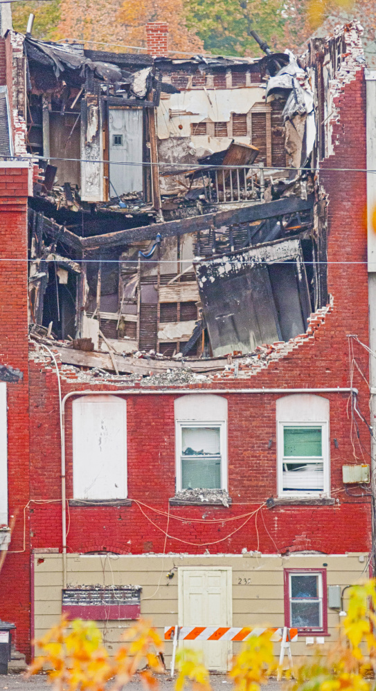 This October file photo shows the collapsed roof on 235 Water St. in Gardiner that was heavily damaged by a fire in July.